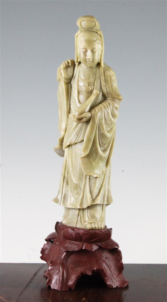 A Chinese pale green soapstone figure of Guanyin, 20th century, 35.5cm